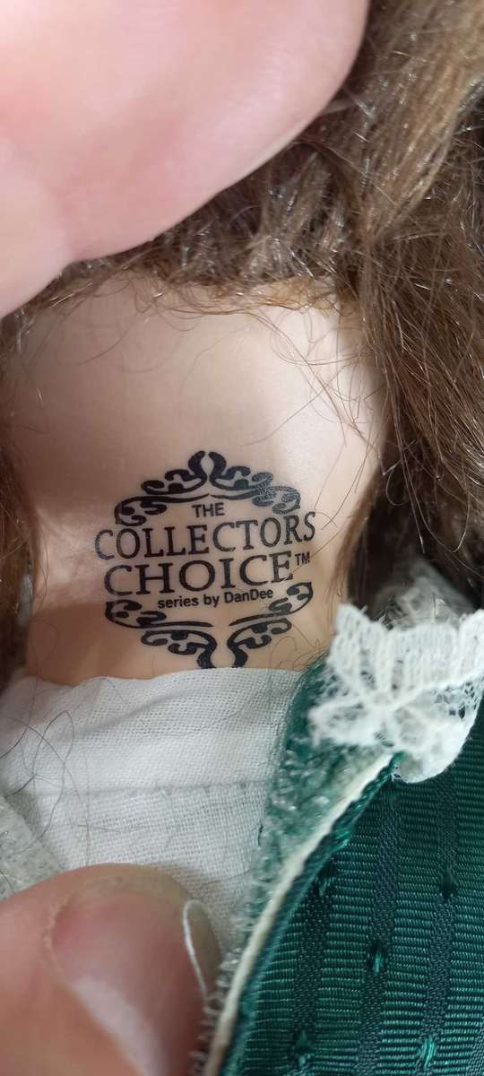 Trio of Porcelain Dolls on stands