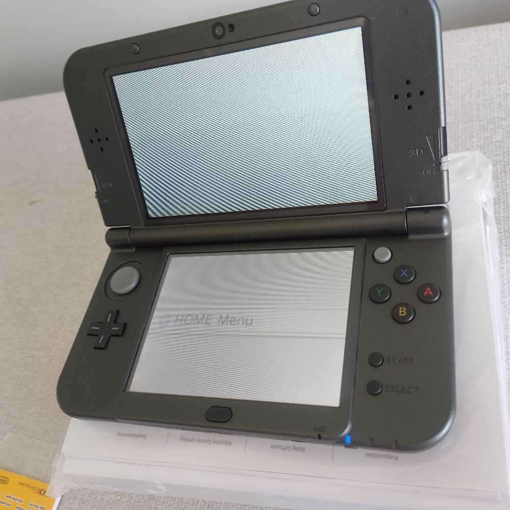 `New` Nintendo 3ds xl console with box +original charger +games (e-shop)