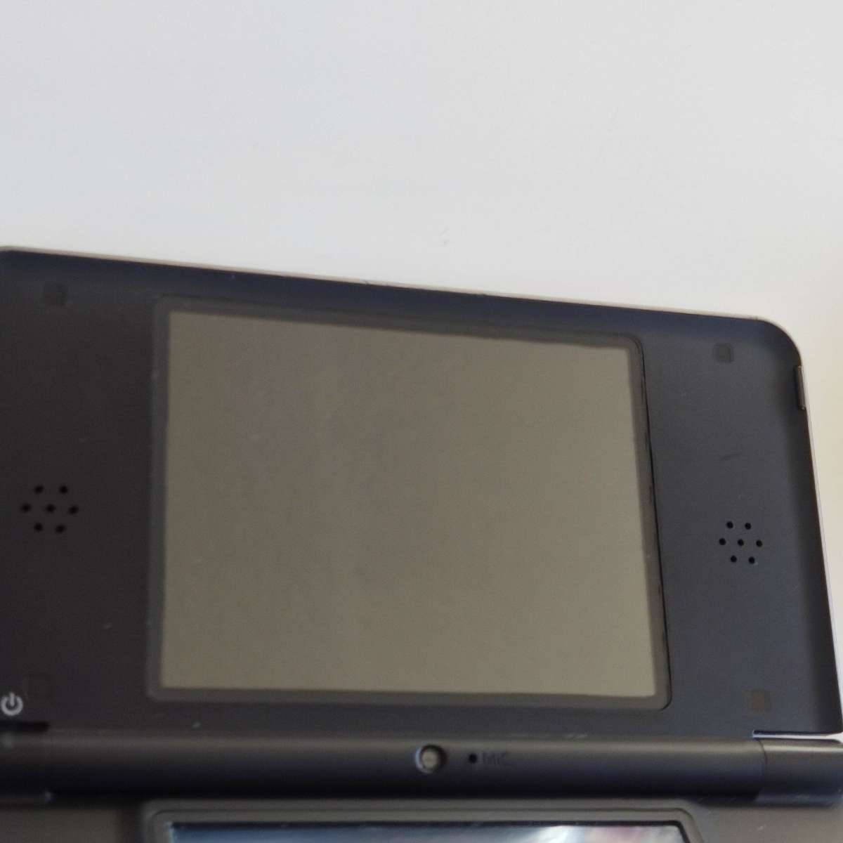 Nintendo Dsi Xl console with original charger