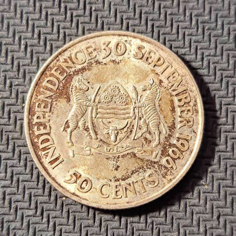 4 x silver coins. Botswana 50 cents, Independence 1966