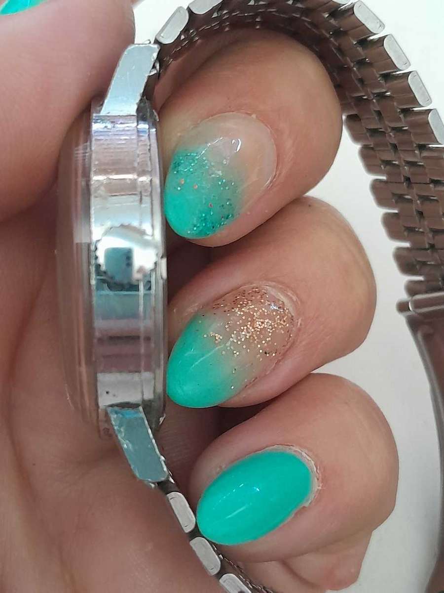 Rotary wind up watch