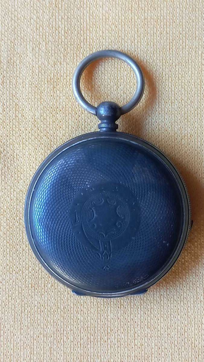 Pocket watch with  silver engraved casing