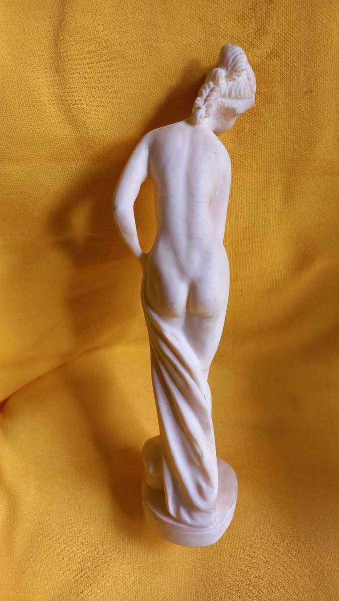 Vintage nude statues of Davide and Aphrodite Venus
