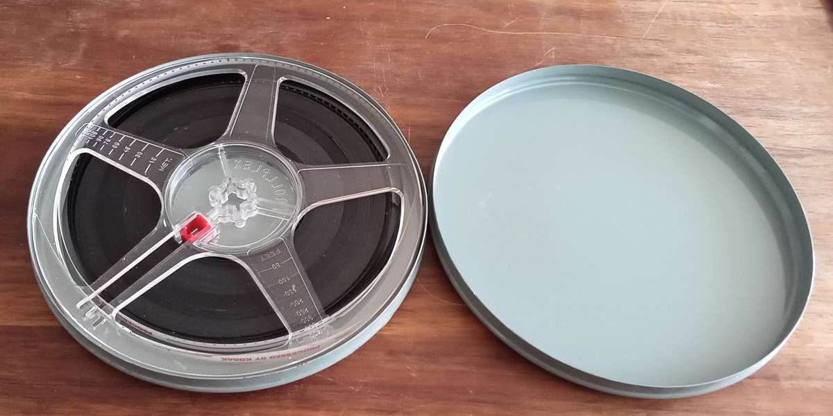 9.5mm Projector Film Reel in Vintage Tin. Blyderiver Canyon, Salt Rock, Game reserve footage.