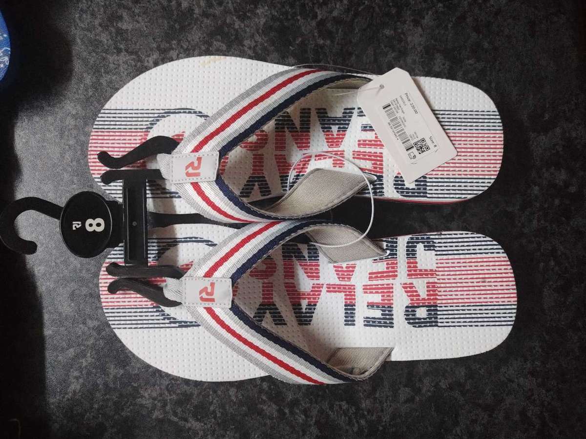 Various clothing and tech items