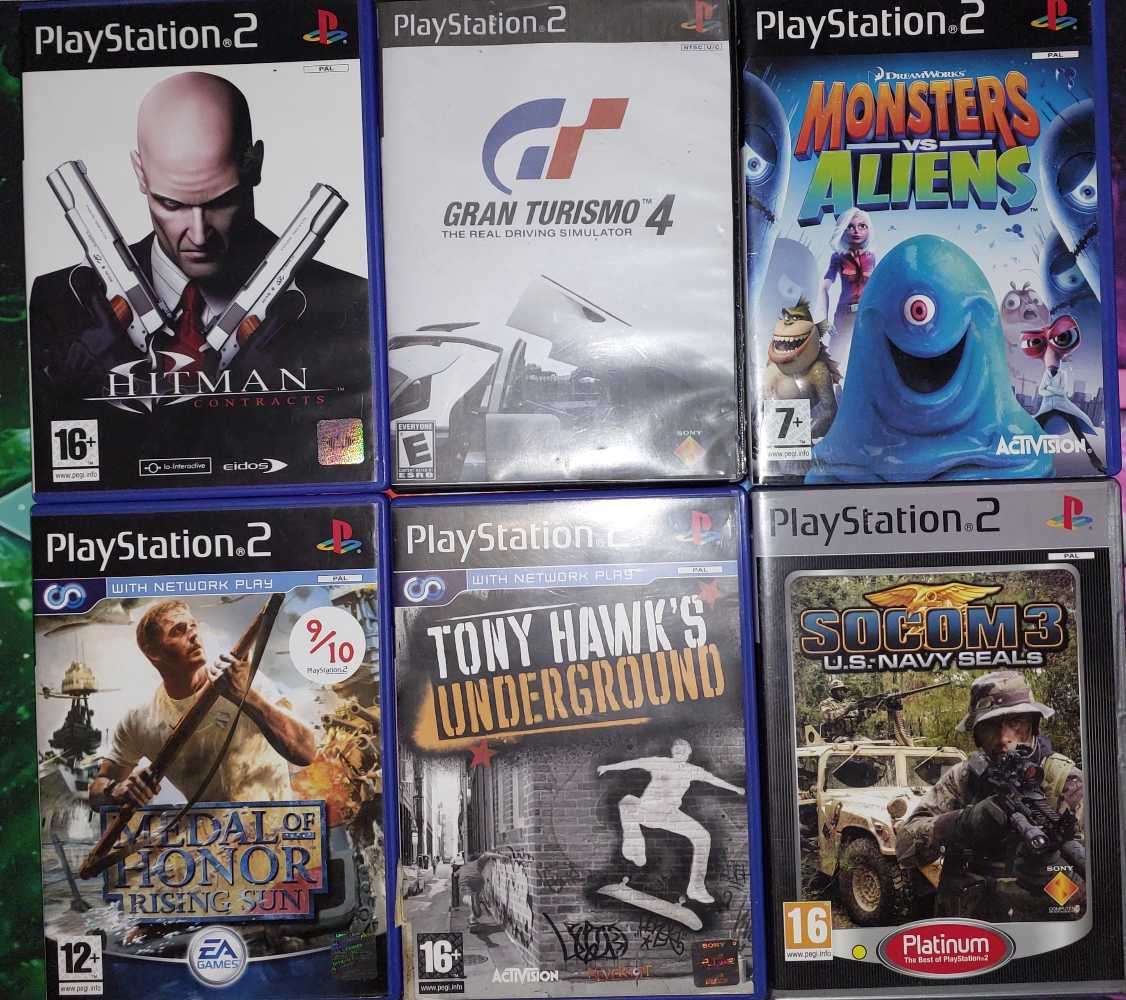 Playstation 2 + x6 Games