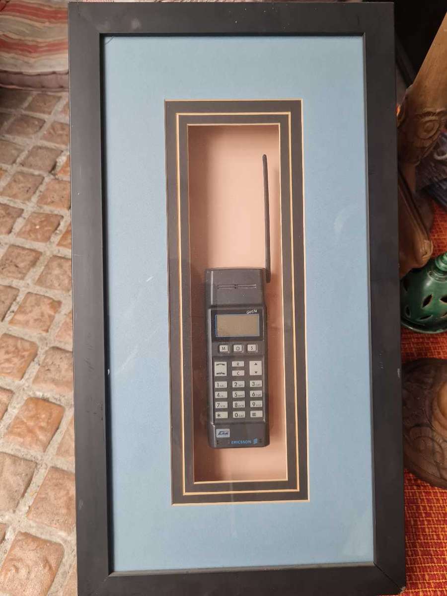 Ericsson GH174 cellphone in glass fronted frame