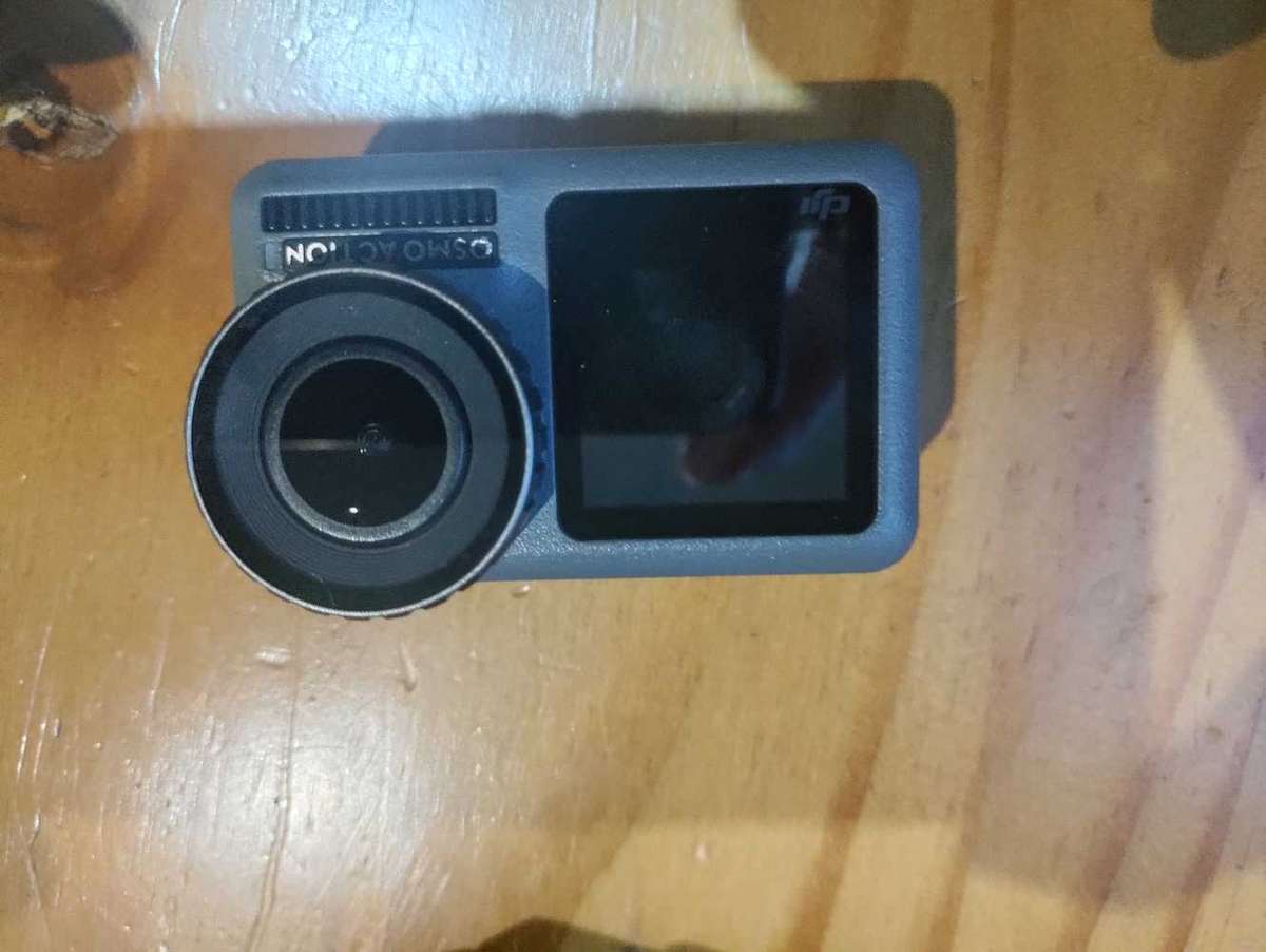 DJI Osmo Action Sports Cam with 64Gb SD card and accessories