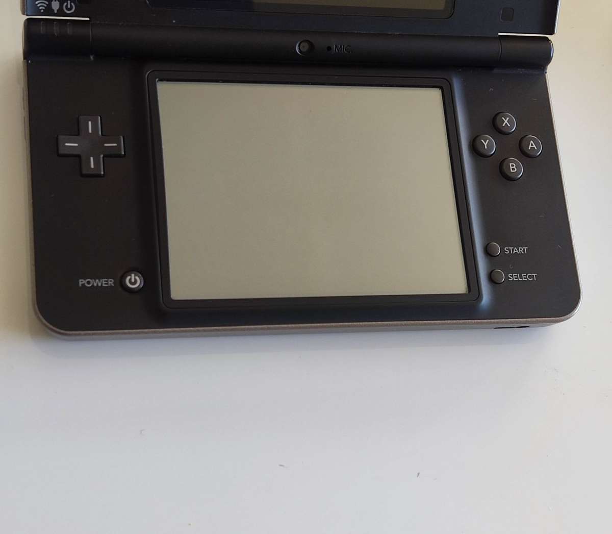 Nintendo Dsi Xl console with original charger