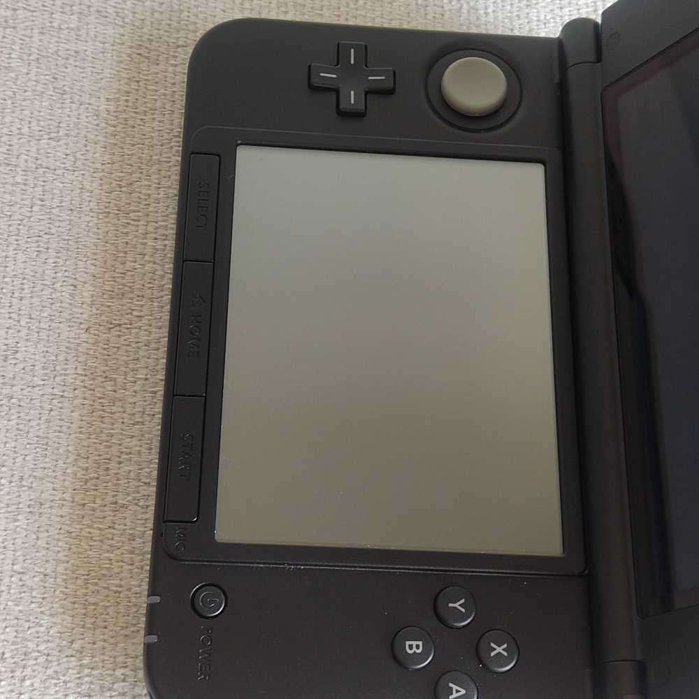 Nintendo 3ds XL console with original charger