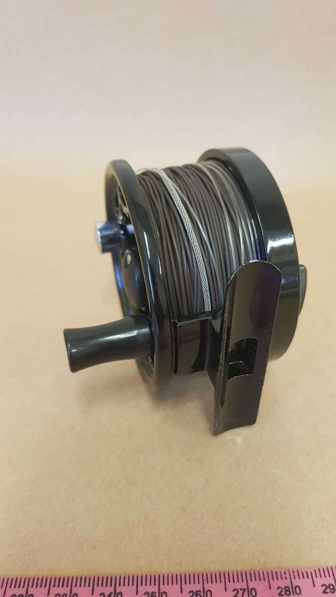 Explorer fly reel loaded with backing, fly line and tippett.