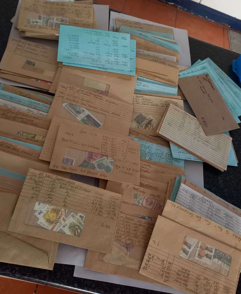 HUNDREDS OF STAMP FILLED ENVELOPES