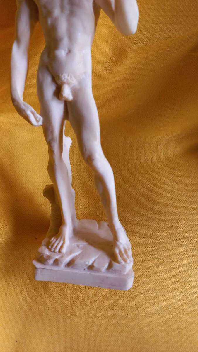 Vintage nude statues of Davide and Aphrodite Venus
