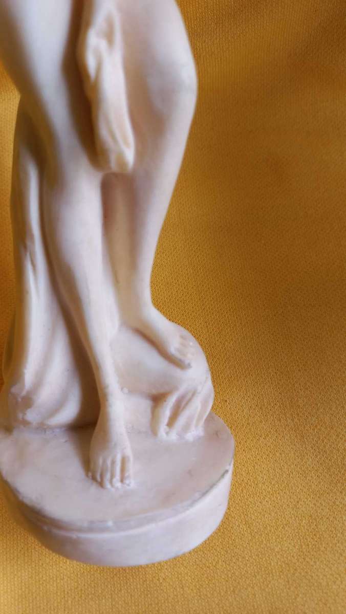 Vintage nude statues of Davide and Aphrodite Venus