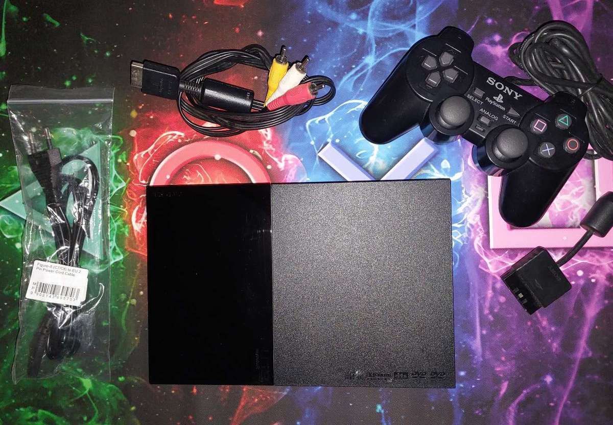 Playstation 2 + x6 Games