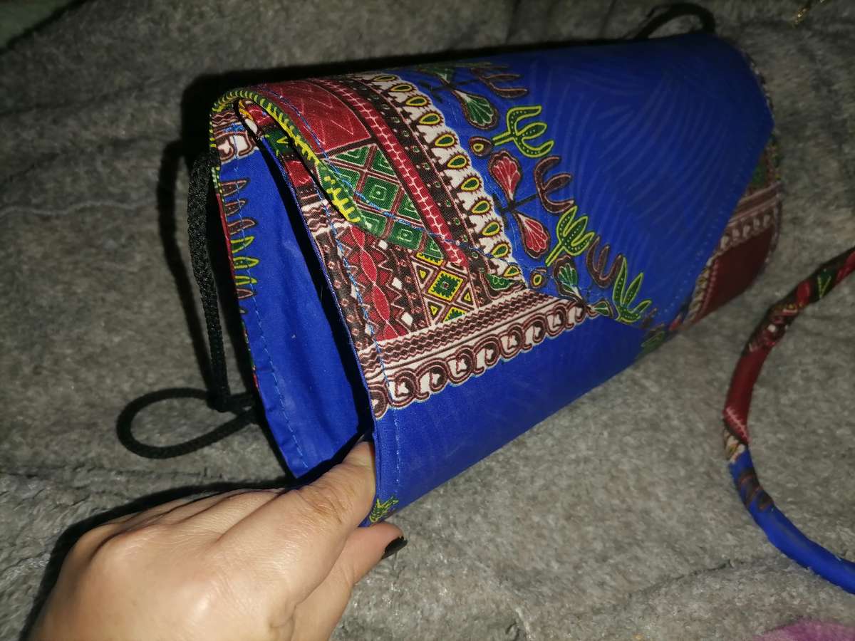 African clutch bag, neck piece, earrings and head scarf