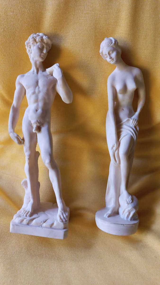 Vintage nude statues of Davide and Aphrodite Venus