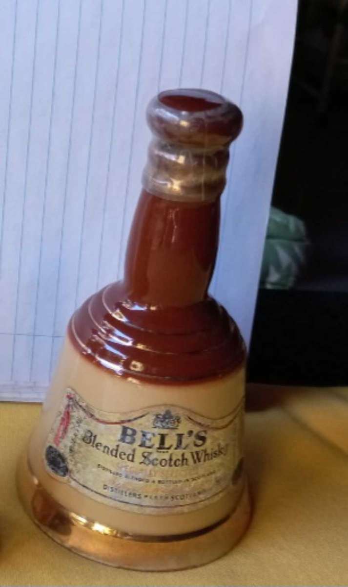 Vintage collectable lot of "Bells Scotch Whisky " bell shaped decanters made by Wade