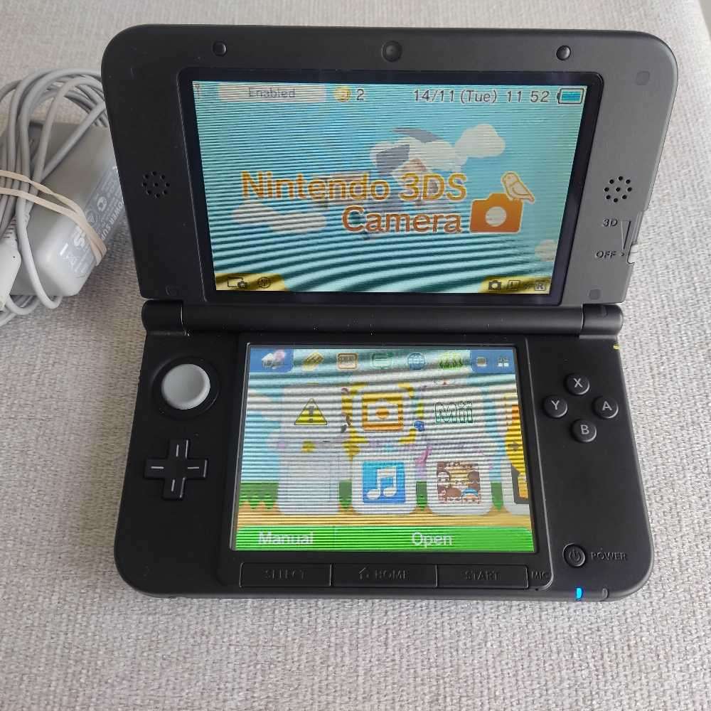Nintendo 3ds XL console with original charger, stylus and memory card