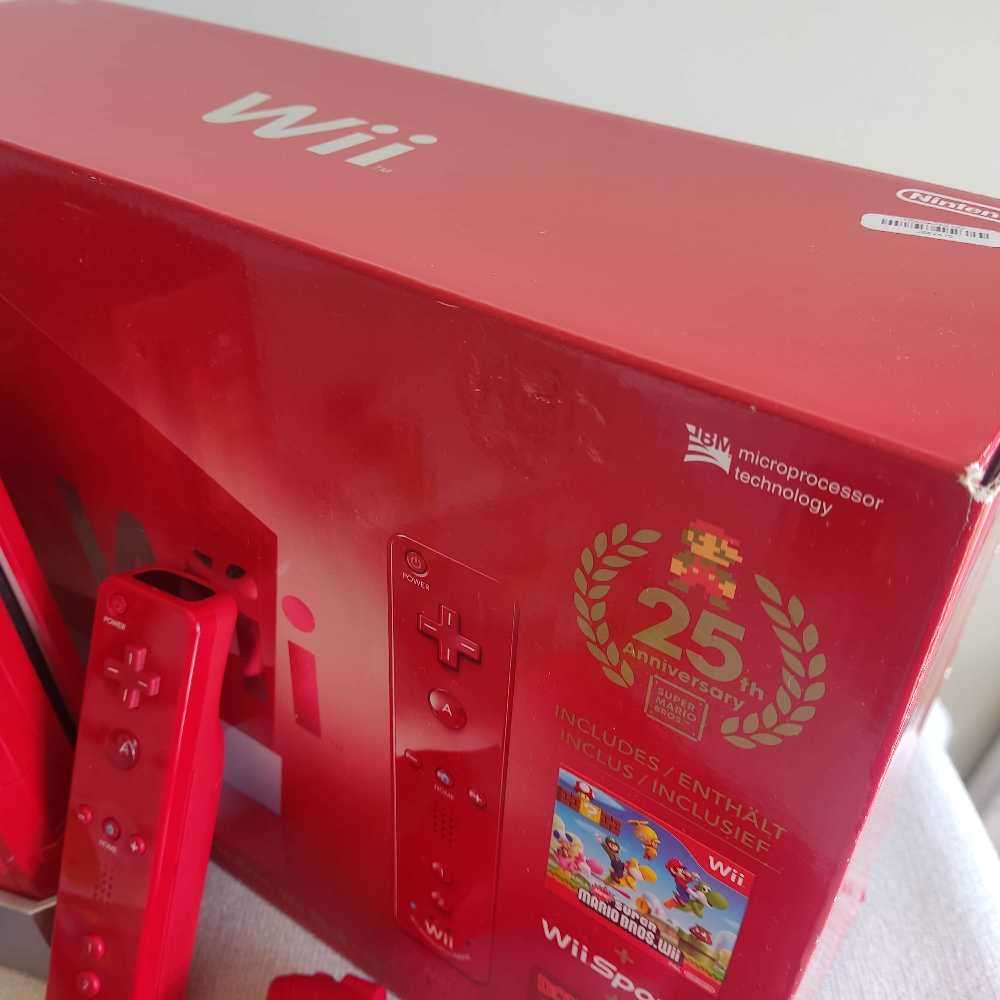 Nintendo Wii console with New Super Mario Bros +Wii Sports