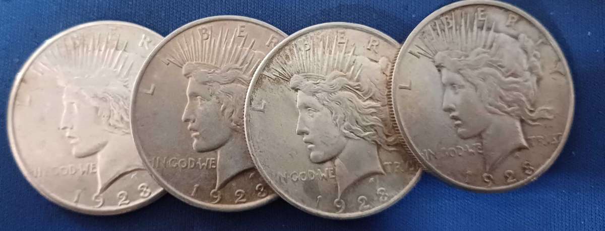 4x1923x90% 106.9 grams Silver USA Dollar coins as 1 lot