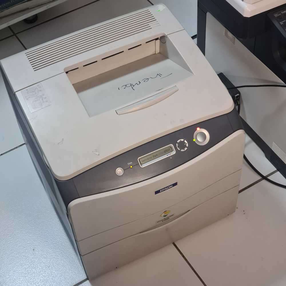 Epson Aculaser c1100 Lazer printer. (turns on, needs attention)