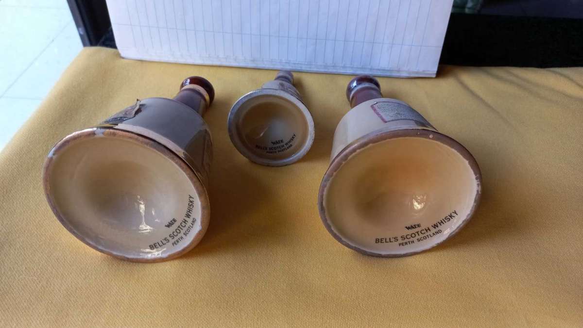 Vintage collectable lot of "Bells Scotch Whisky " bell shaped decanters made by Wade