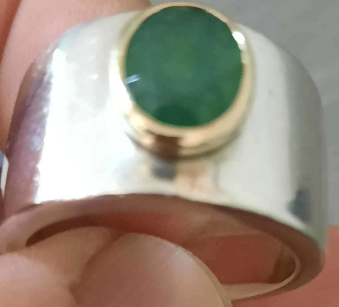 Sterling silver ring with 5.35 ct emerald ring 20 mm wide