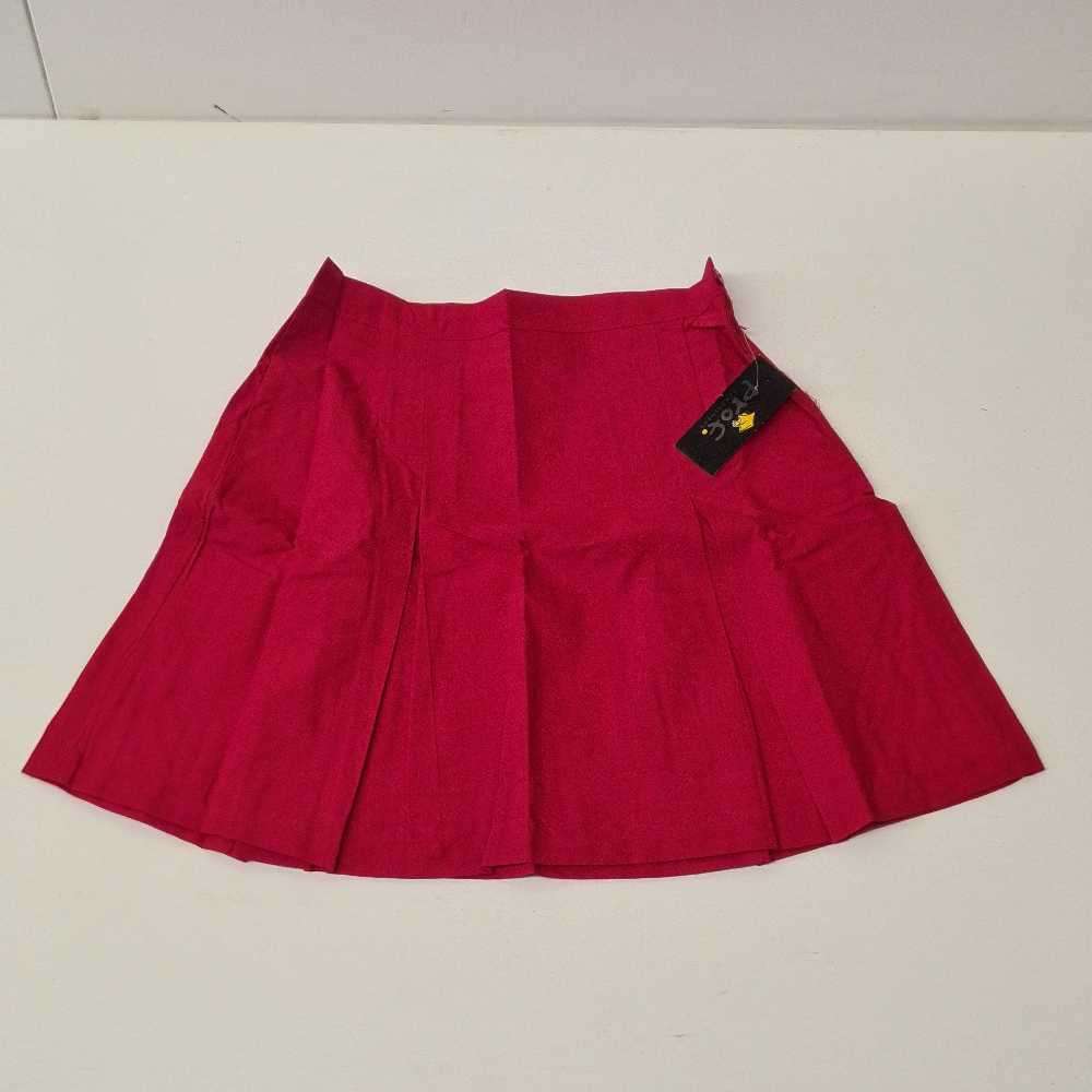 Mid-length girls shirts. School shirts stock