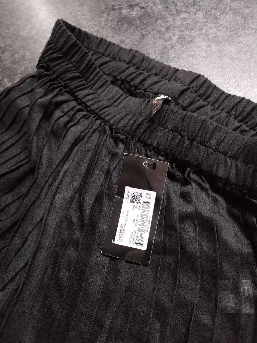 Various clothing and tech items