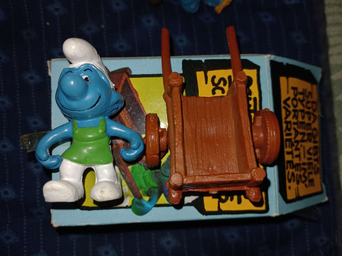 Vintage Smurf with wheelbarrow plus gardener with rake.