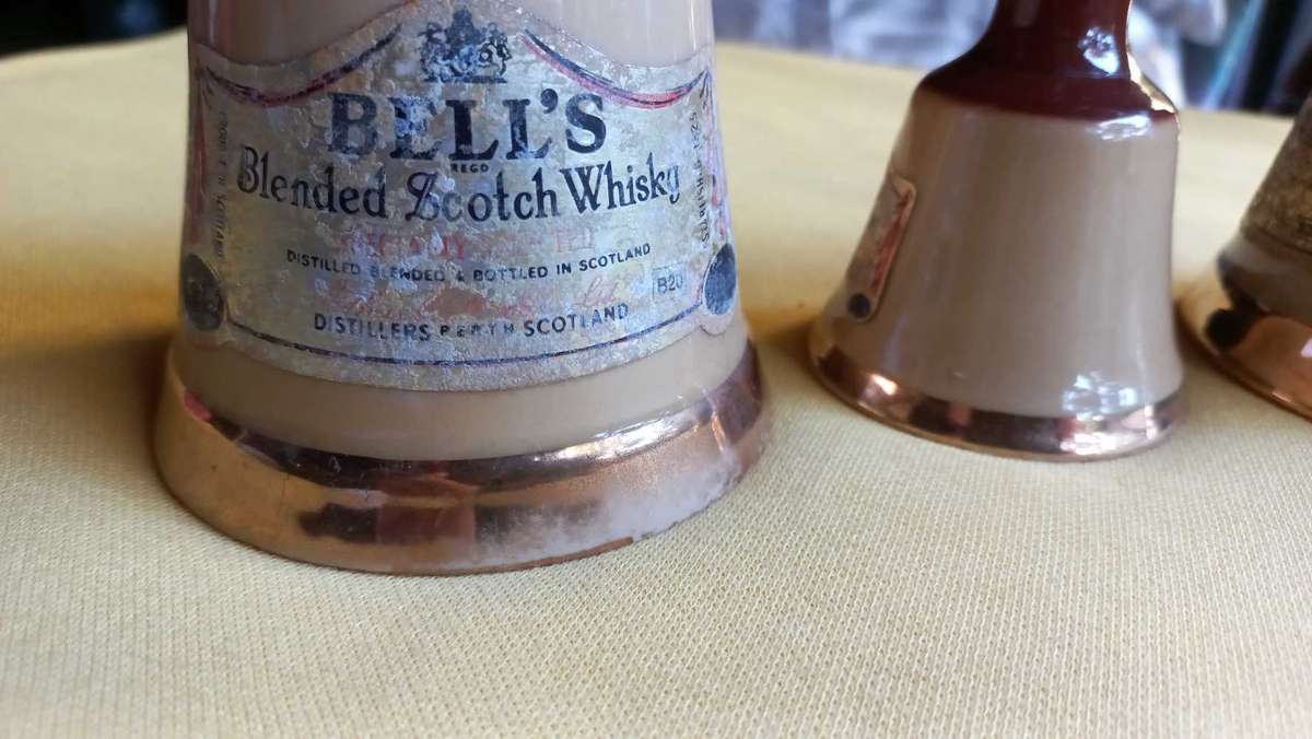 Vintage collectable lot of "Bells Scotch Whisky " bell shaped decanters made by Wade