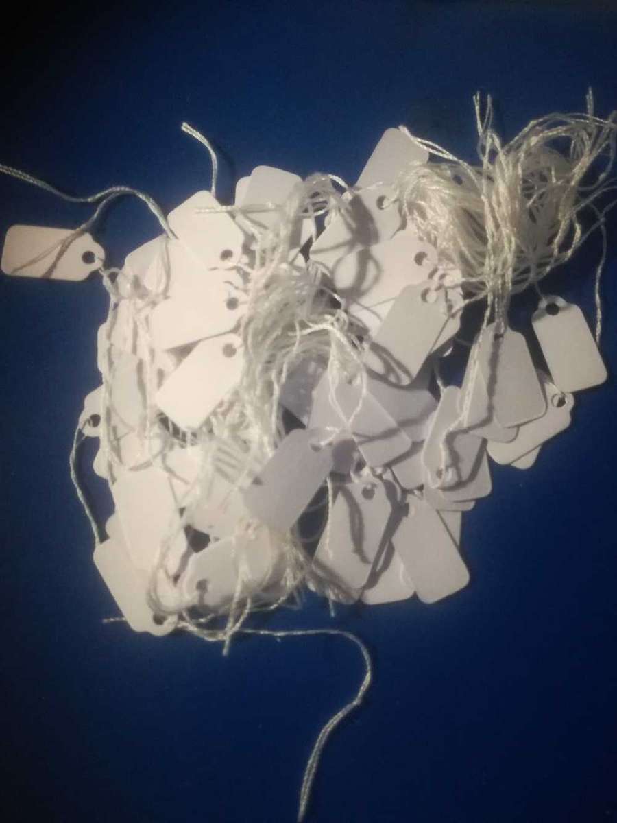 Small price tags with strings 23mm x 13mm(33c each)