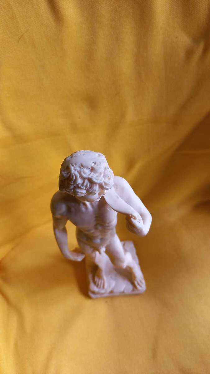 Vintage nude statues of Davide and Aphrodite Venus