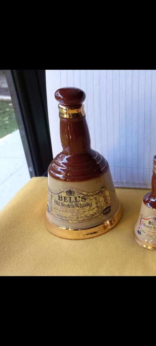 Vintage collectable lot of "Bells Scotch Whisky " bell shaped decanters made by Wade