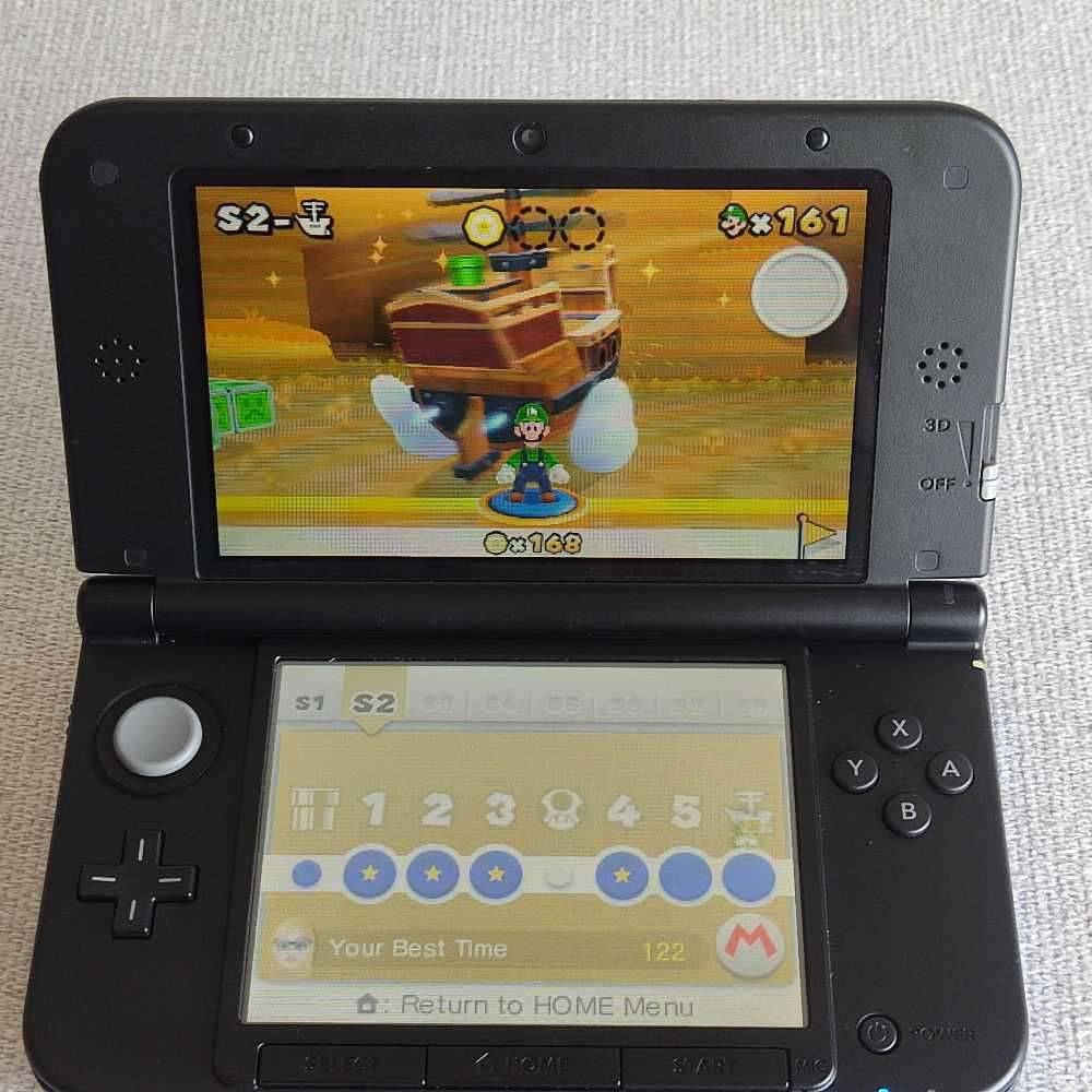 Nintendo 3ds XL console with original charger