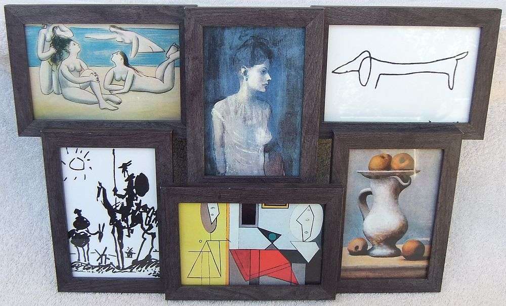 AN AWESOME WALL MOUNTING DEPICTING WORKS BY PICASSO ( PRINTS )