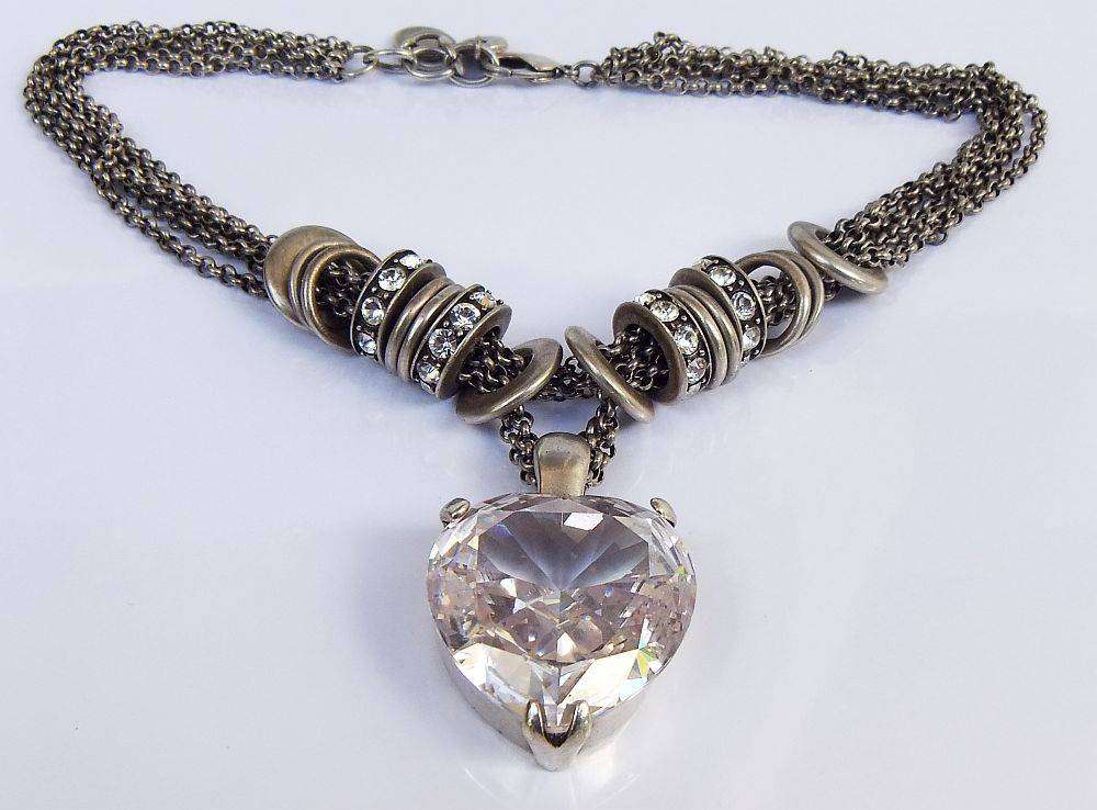 A gorgeous high class genuine Miglio metal necklace with faceted heart pendant