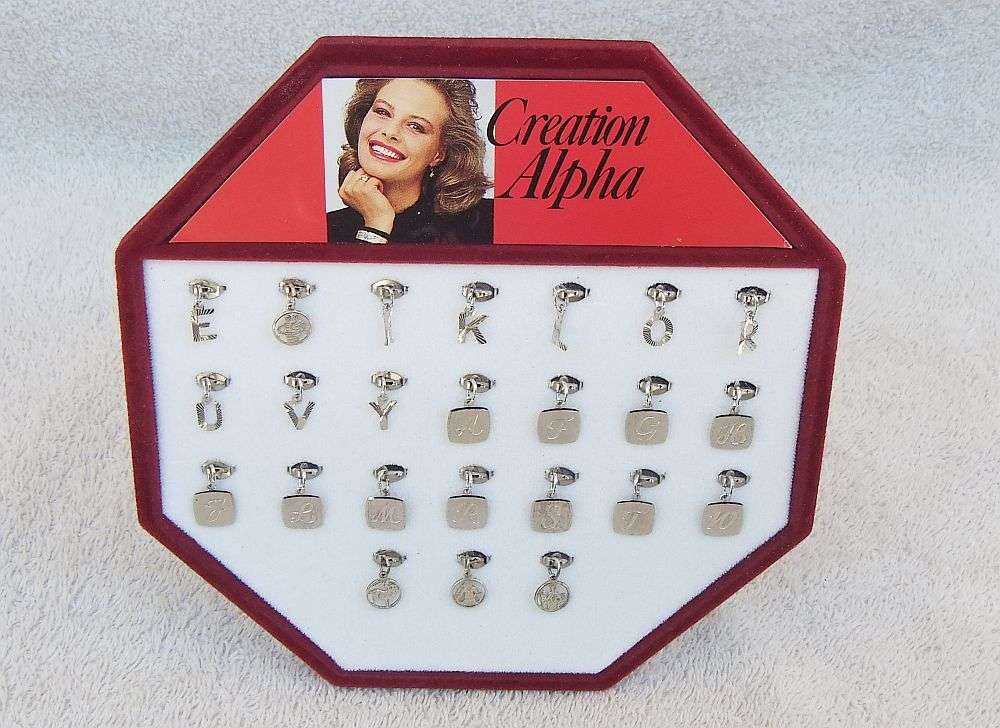 AN AMAZING LOT OF 24 SOLID SILVER PENDANTS - BRAND NEW VINTAGE STOCK - GERMAN AND STERLING SILVER !!