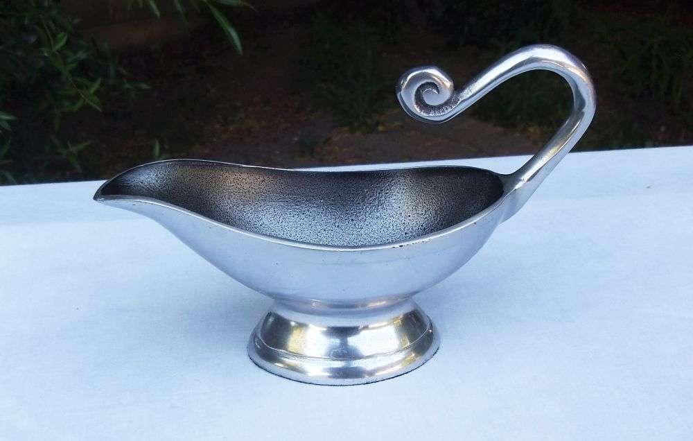 A STUNNING CARROL BOYES STYLE METAL SAUCE OR GRAVY BOAT