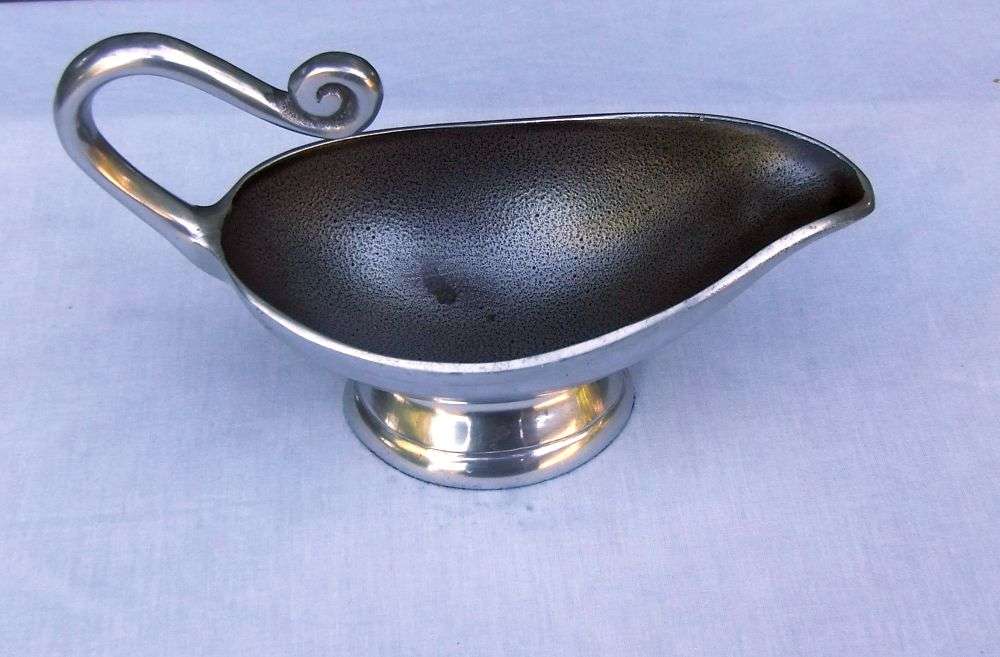 A STUNNING CARROL BOYES STYLE METAL SAUCE OR GRAVY BOAT