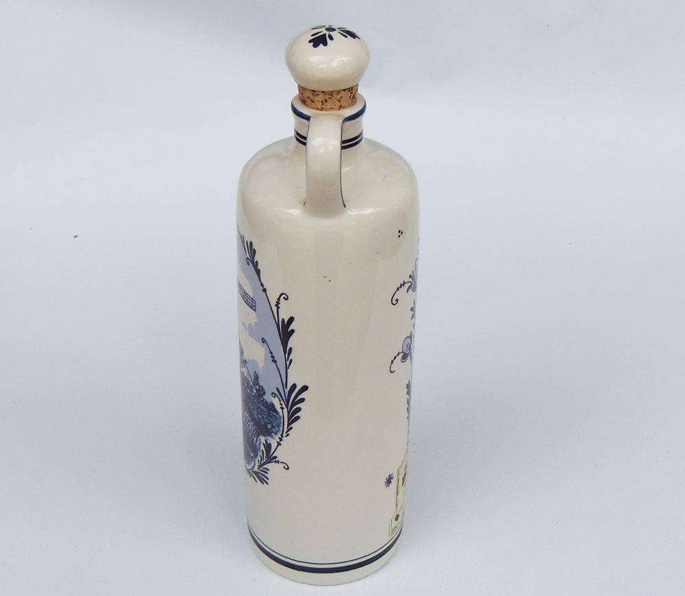 An awesome vintage Delfts Blue decanter made for Bols brandy with windmill motif