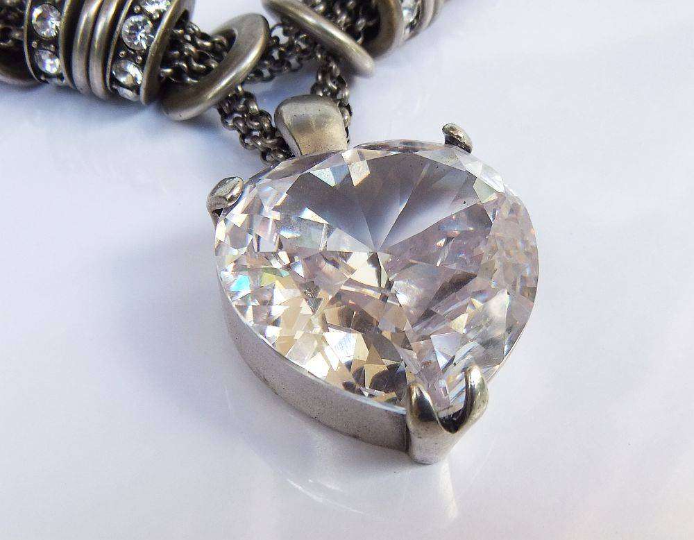 A gorgeous high class genuine Miglio metal necklace with faceted heart pendant