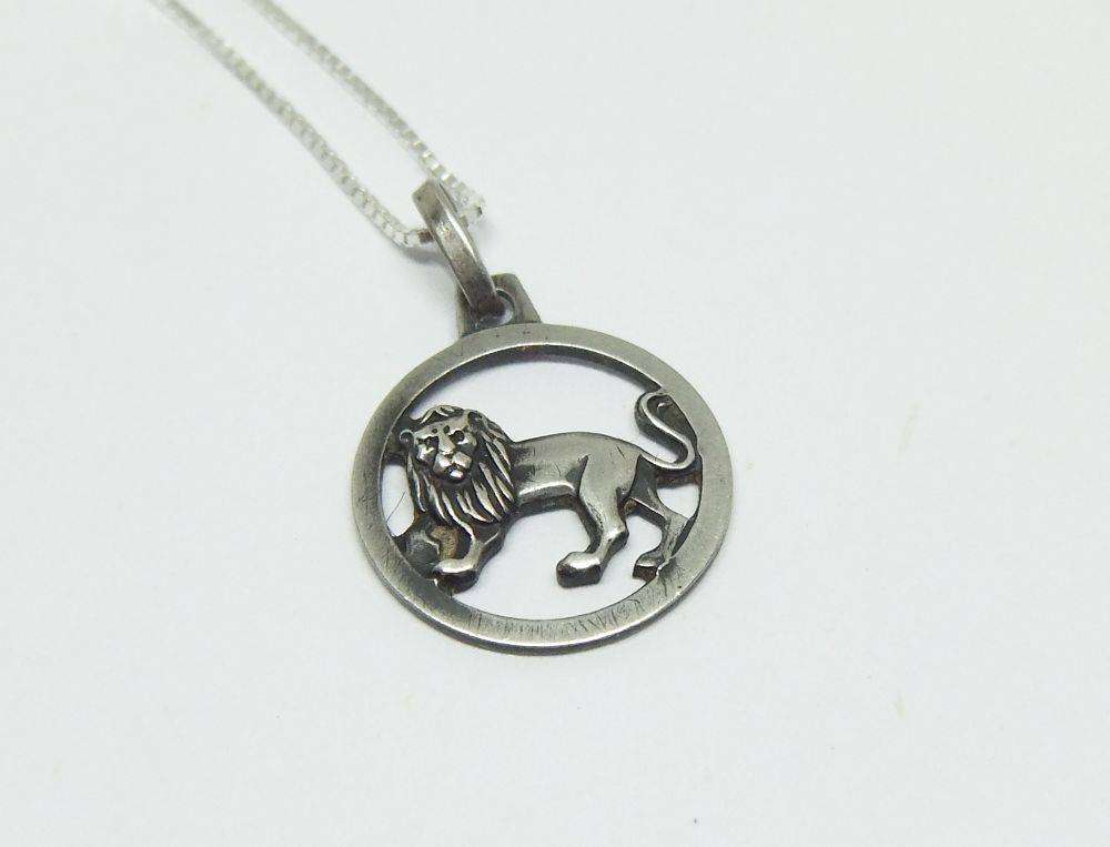 A vintage sterling silver Leo lion Zodiac pendant plus sterling silver necklace