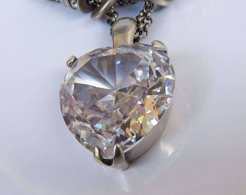 A gorgeous high class genuine Miglio metal necklace with faceted heart pendant