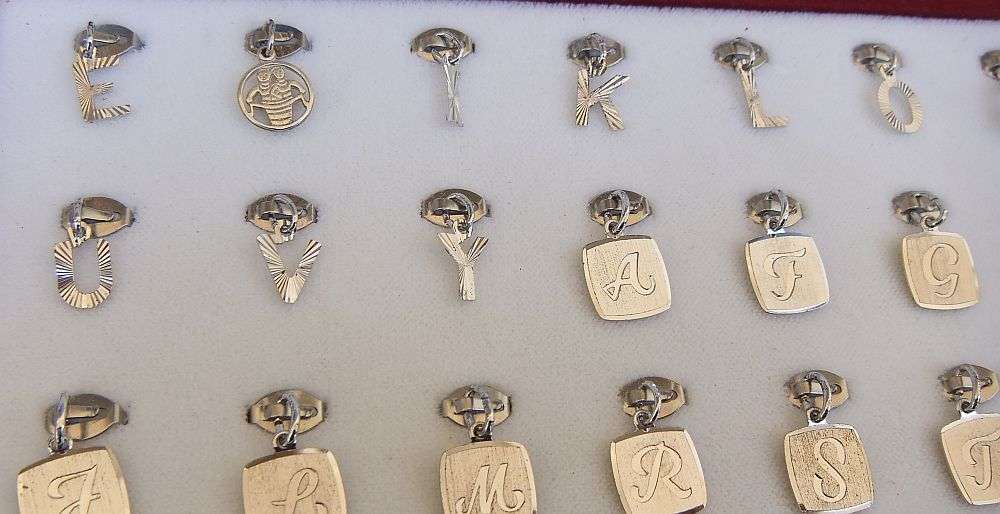 AN AMAZING LOT OF 24 SOLID SILVER PENDANTS - BRAND NEW VINTAGE STOCK - GERMAN AND STERLING SILVER !!