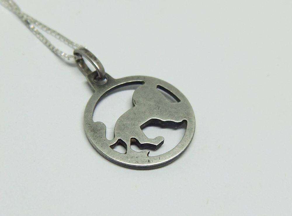 A vintage sterling silver Leo lion Zodiac pendant plus sterling silver necklace