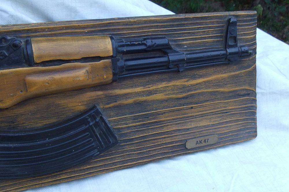 A rare vintage 1980`s hard foam wall mount demonstrational mold of an AK47 assault rifle