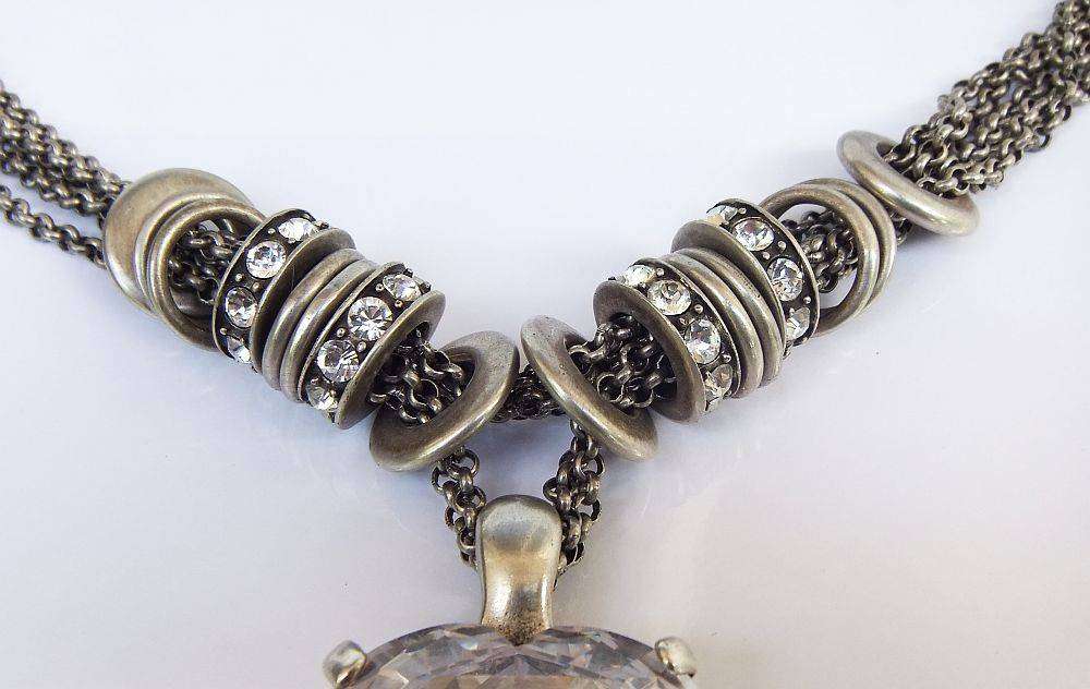 A gorgeous high class genuine Miglio metal necklace with faceted heart pendant