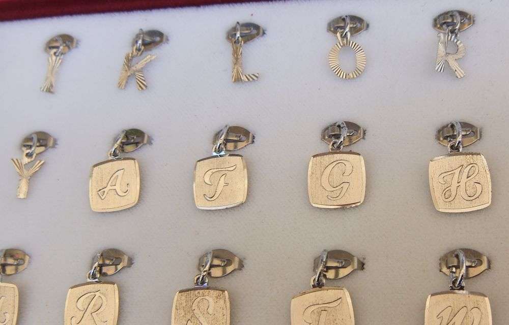 AN AMAZING LOT OF 24 SOLID SILVER PENDANTS - BRAND NEW VINTAGE STOCK - GERMAN AND STERLING SILVER !!